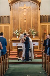 Bride and Groom first kiss at Bay Area Church Wedding
