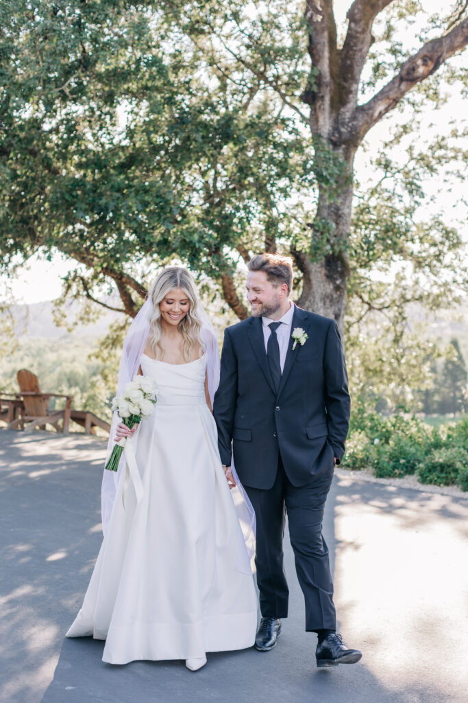 bride and groom walking at copain winery 