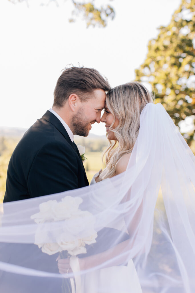 bride and groom portraits with veil at copain winery 