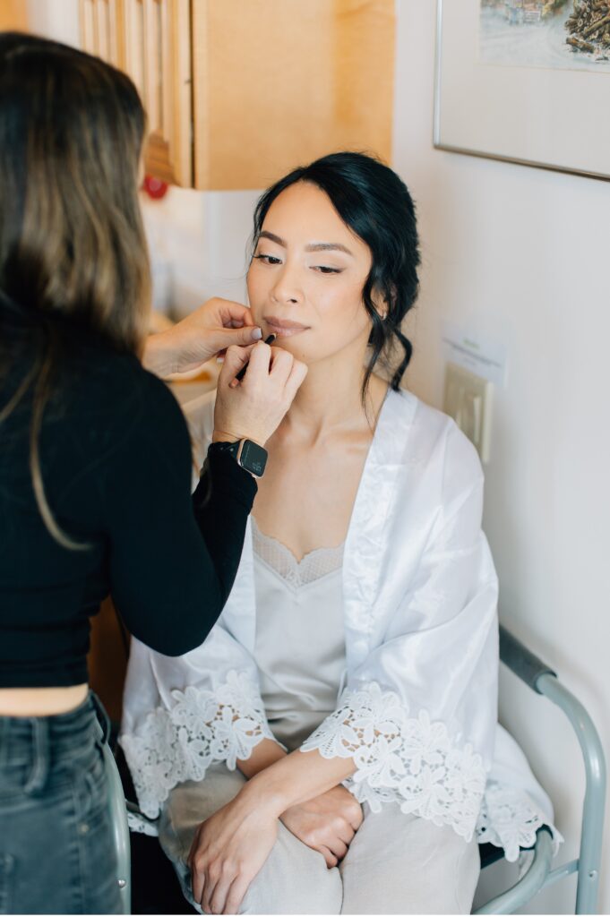 bride getting ready at wine country wedding