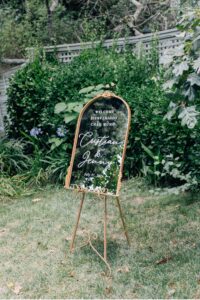 welcome sign at vine hill house wedding