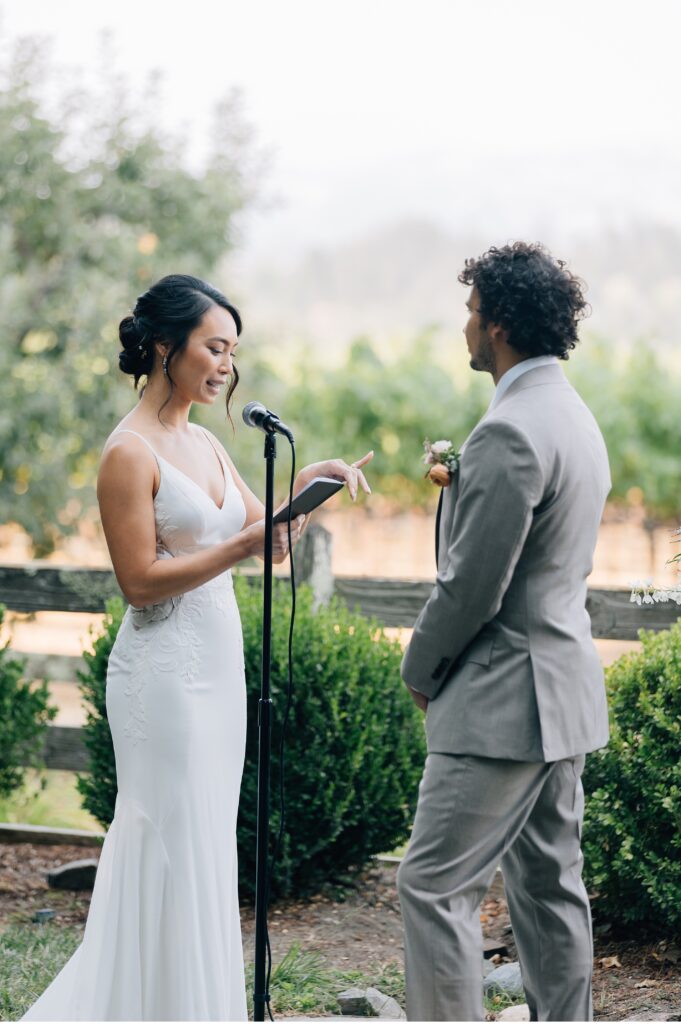 bride reading vows at vine hill house wedding