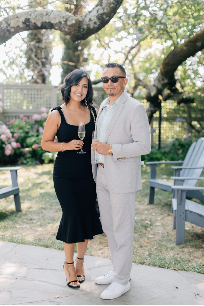 guests posed photo at wine country wedding