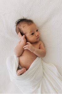 newborn wrapped in blanket