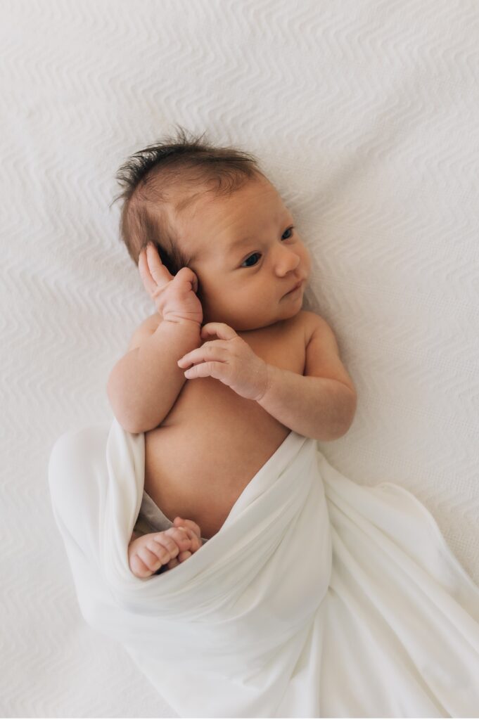 newborn wrapped in blanket