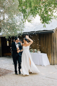 Bride and groom entering reception at Rus Farm Healdsburg wedding