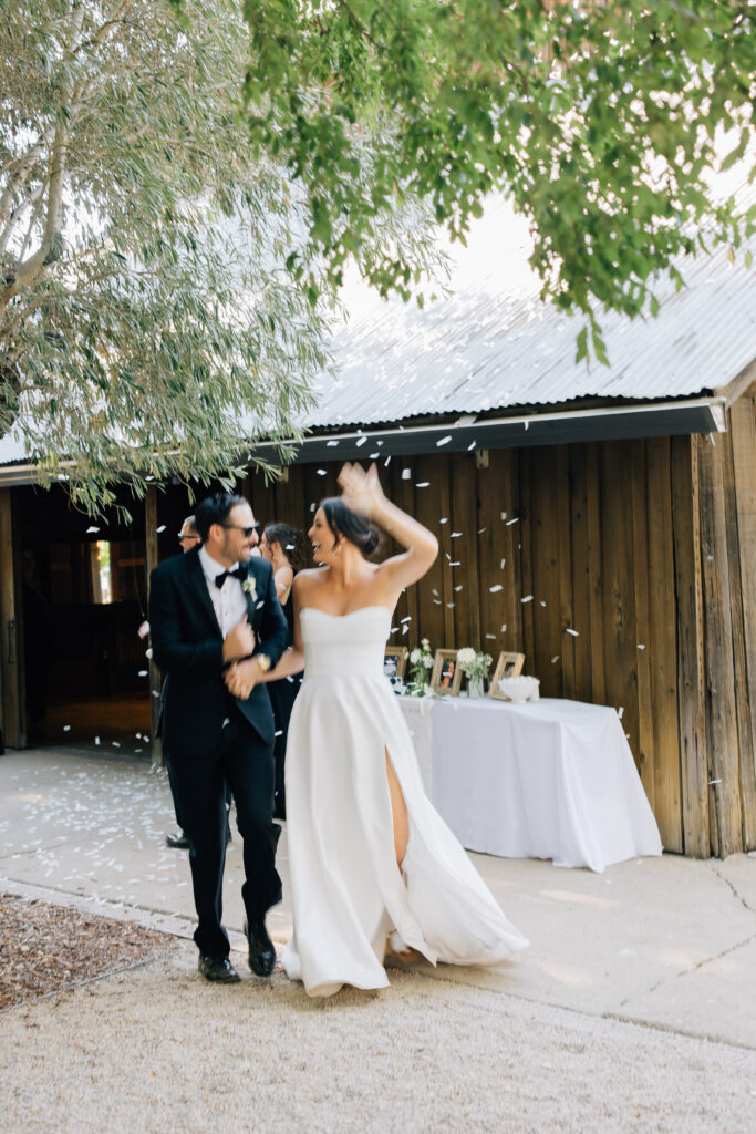 Bride and groom entering reception at Rus Farm Healdsburg wedding